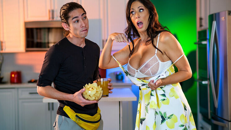 Reagan Foxx, a MILF with big tits, enjoys cum on her tits