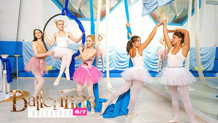 Blonde and Brunette Ballerinas Kiss