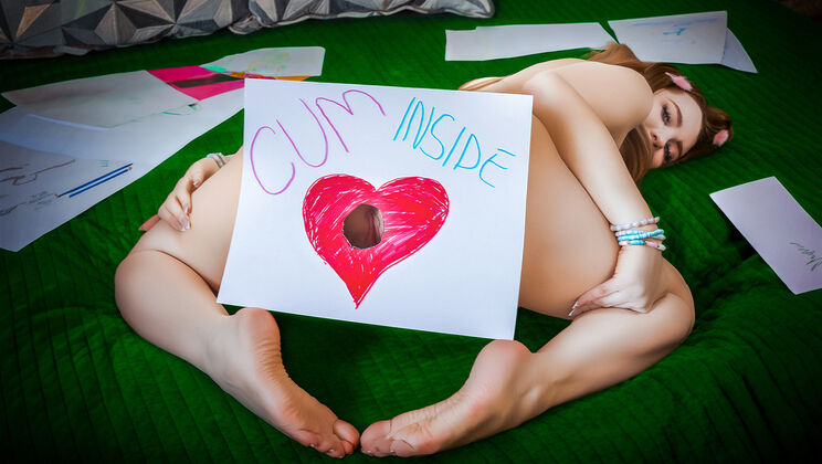 Brunette Sitter's Belly Button Piercings